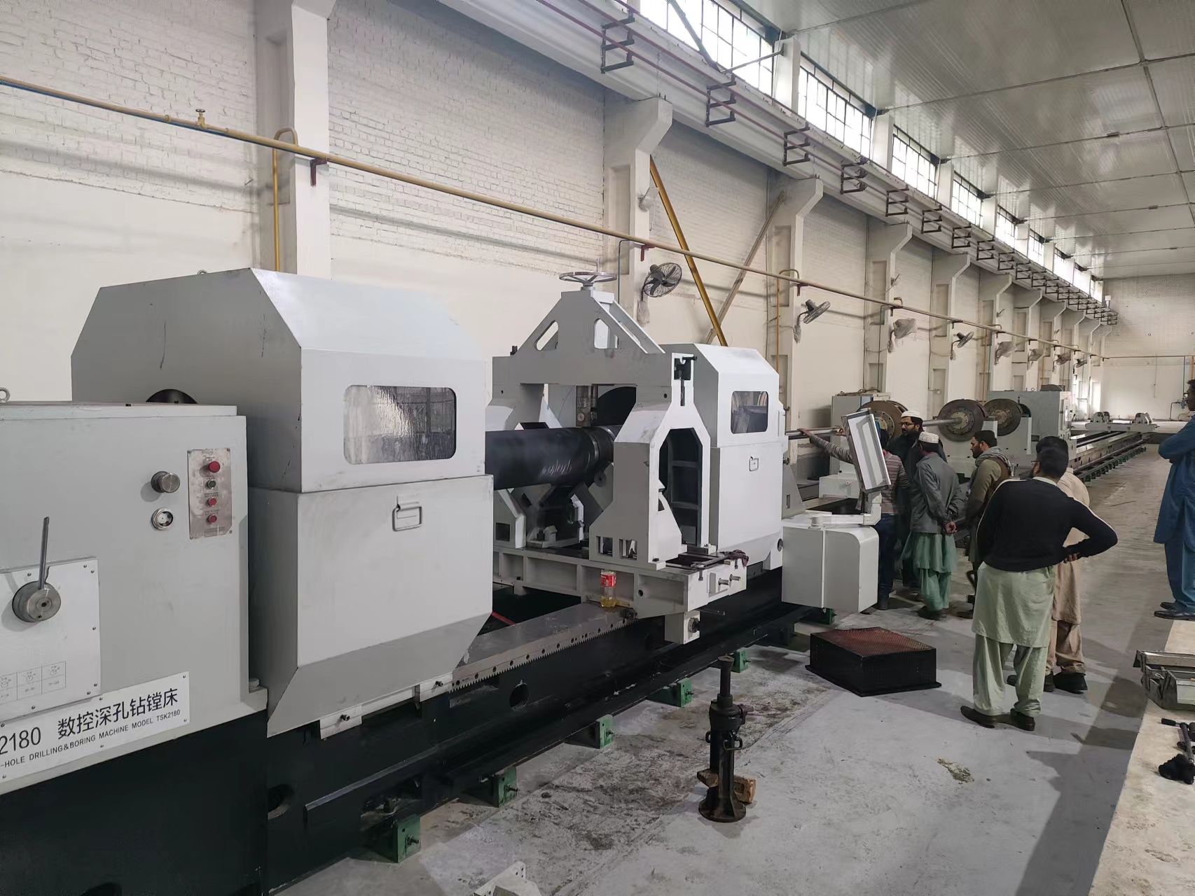 Engineers is installing deep hole drilling machine in Pakistan
